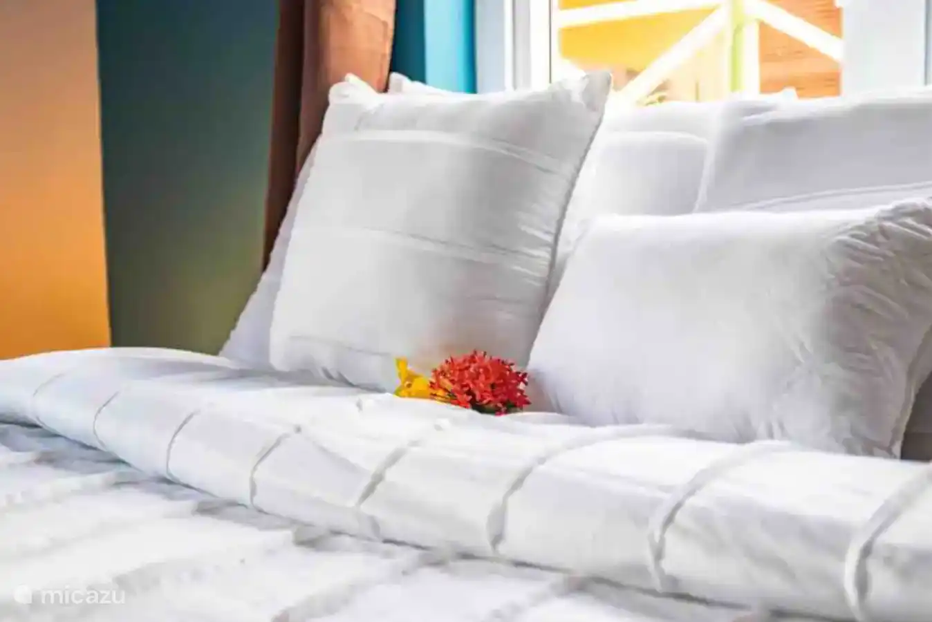 Beide Schlafzimmer verfügen über ein Queensize-Bett.