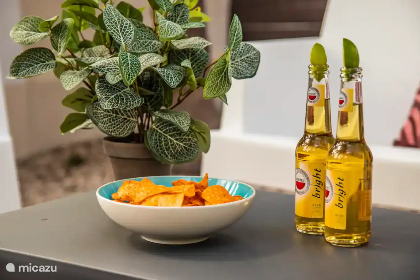 Genießen Sie entspannte Stunden auf dem Balkon und im privaten Garten.