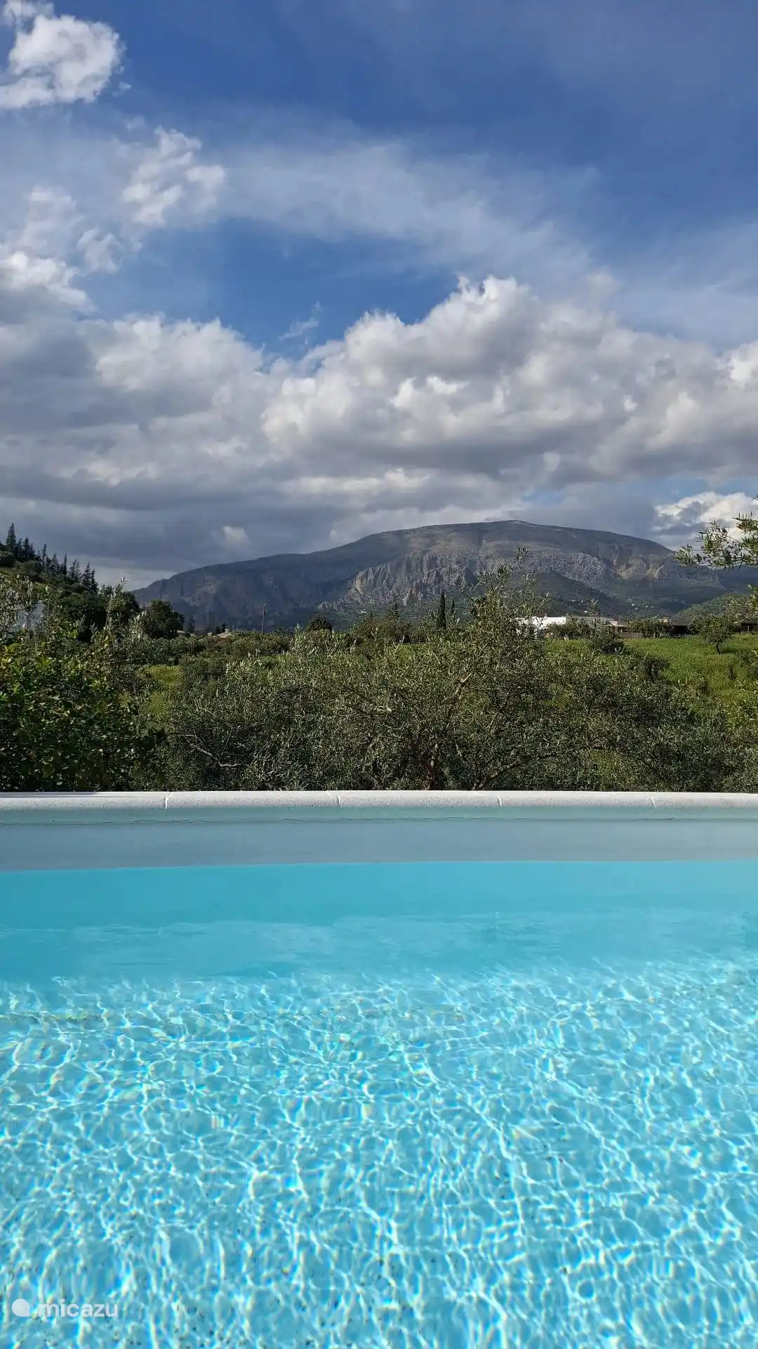 Uitzicht vanaf het terras/zwembad