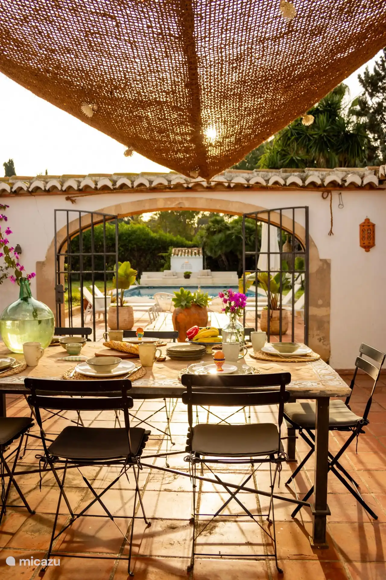 The patio with BBQ and sitting area