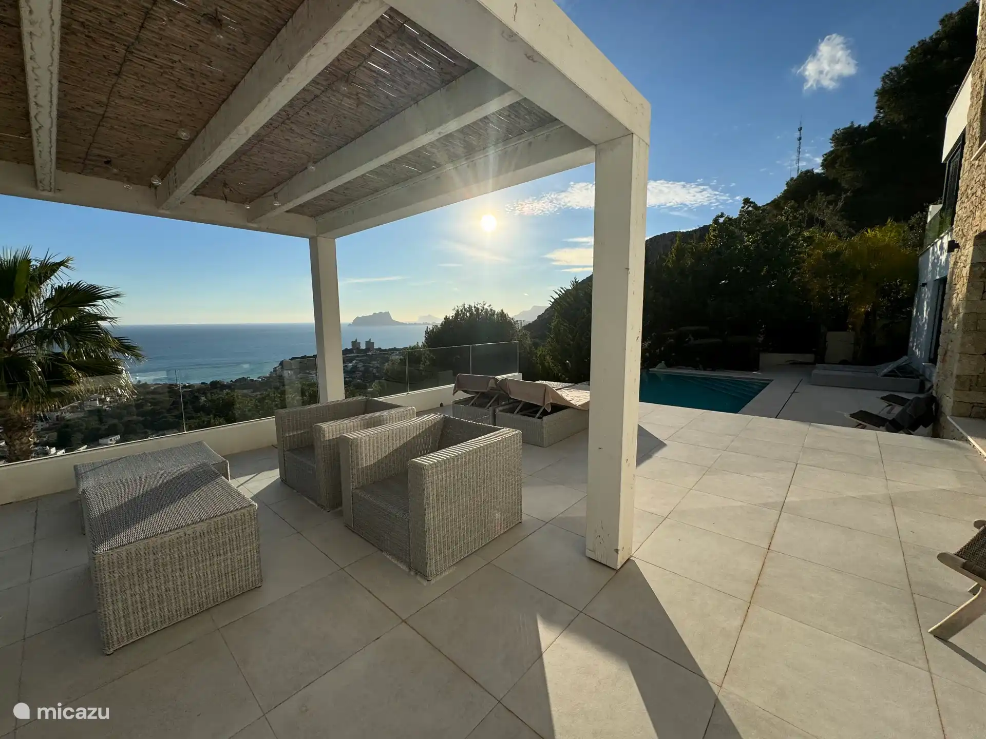 lounge area next to the pool