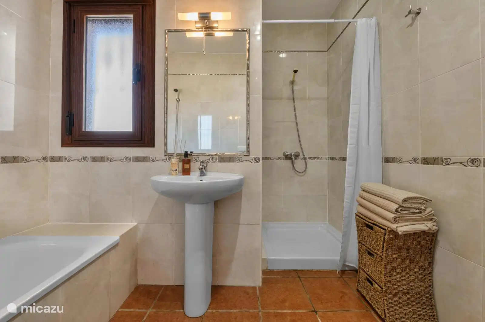 Bathroom 1 with bath, shower and toilet