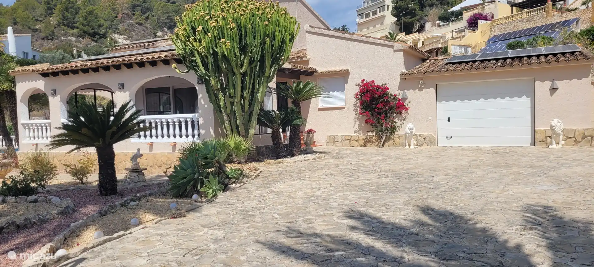 Villa entrance, parking space