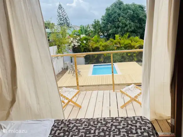 Toko Ti | Curaçao, Banda Ariba (est), Brakkeput Abou - maison de vacances Chambre avec lit kingzise avec vue sur la piscine