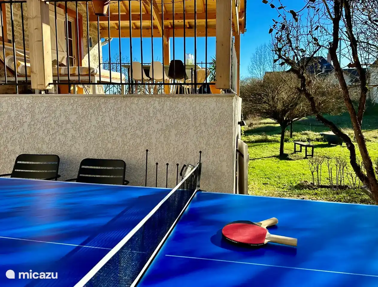 At Maison Fermontes there is a table tennis table with plenty of bats and balls.