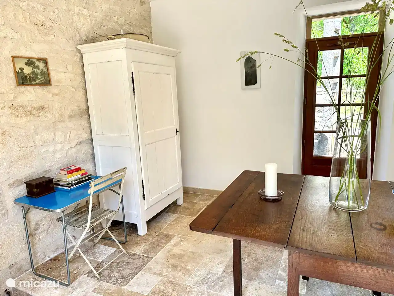 Beautiful old table with cupboard in the hall.