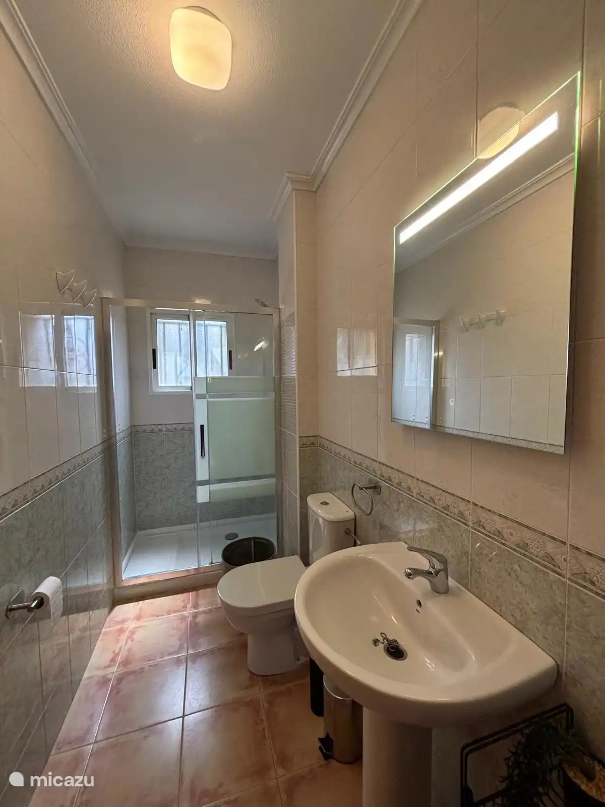 Shower room with sink and toilet