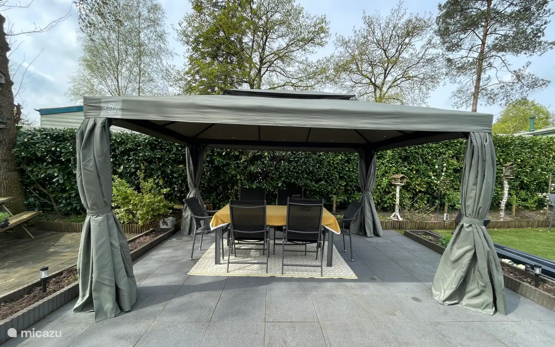 A spacious garden pavilion to sit in the shade even when the weather is nice. 