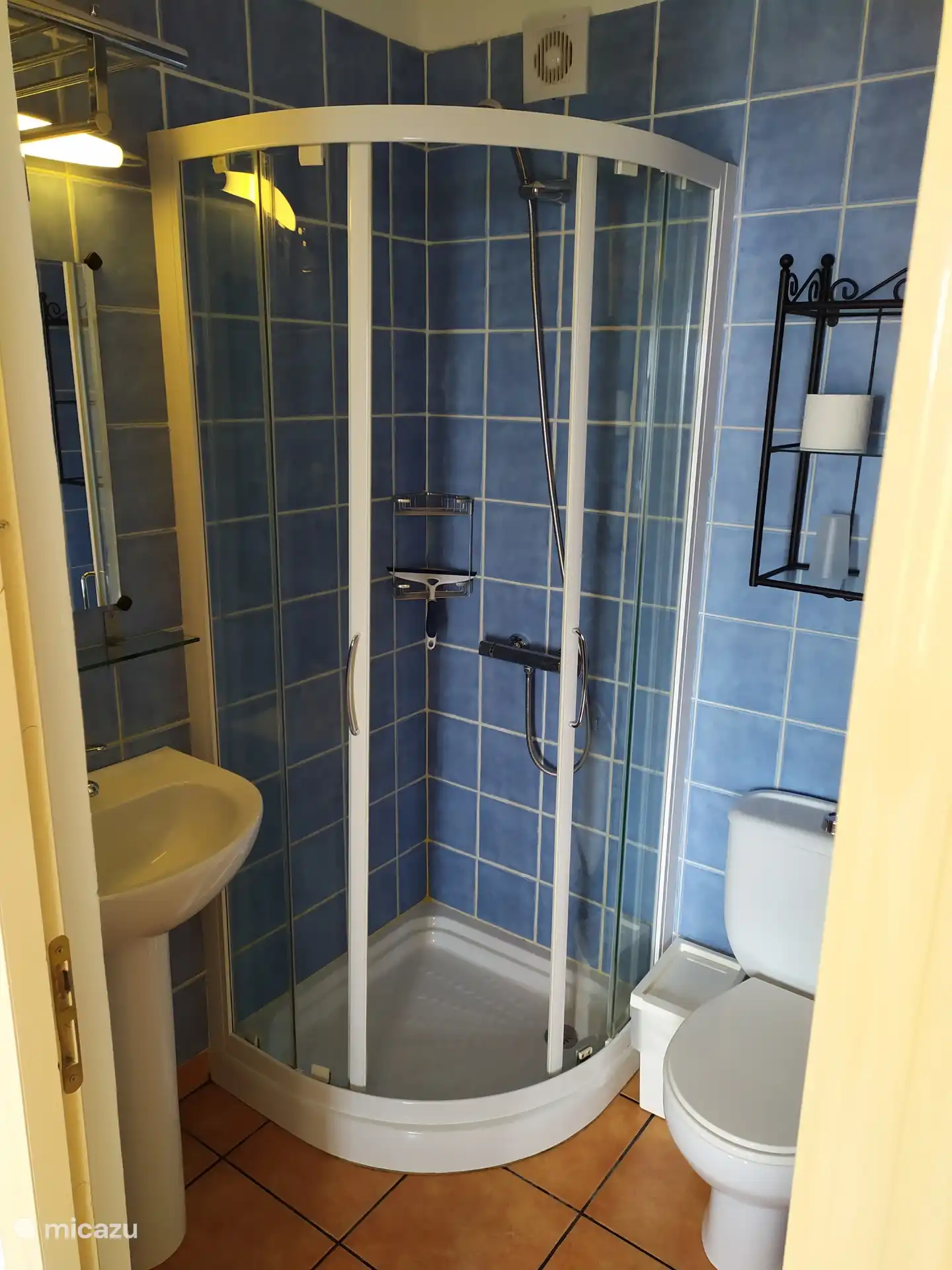 Bathroom with hair dryer.