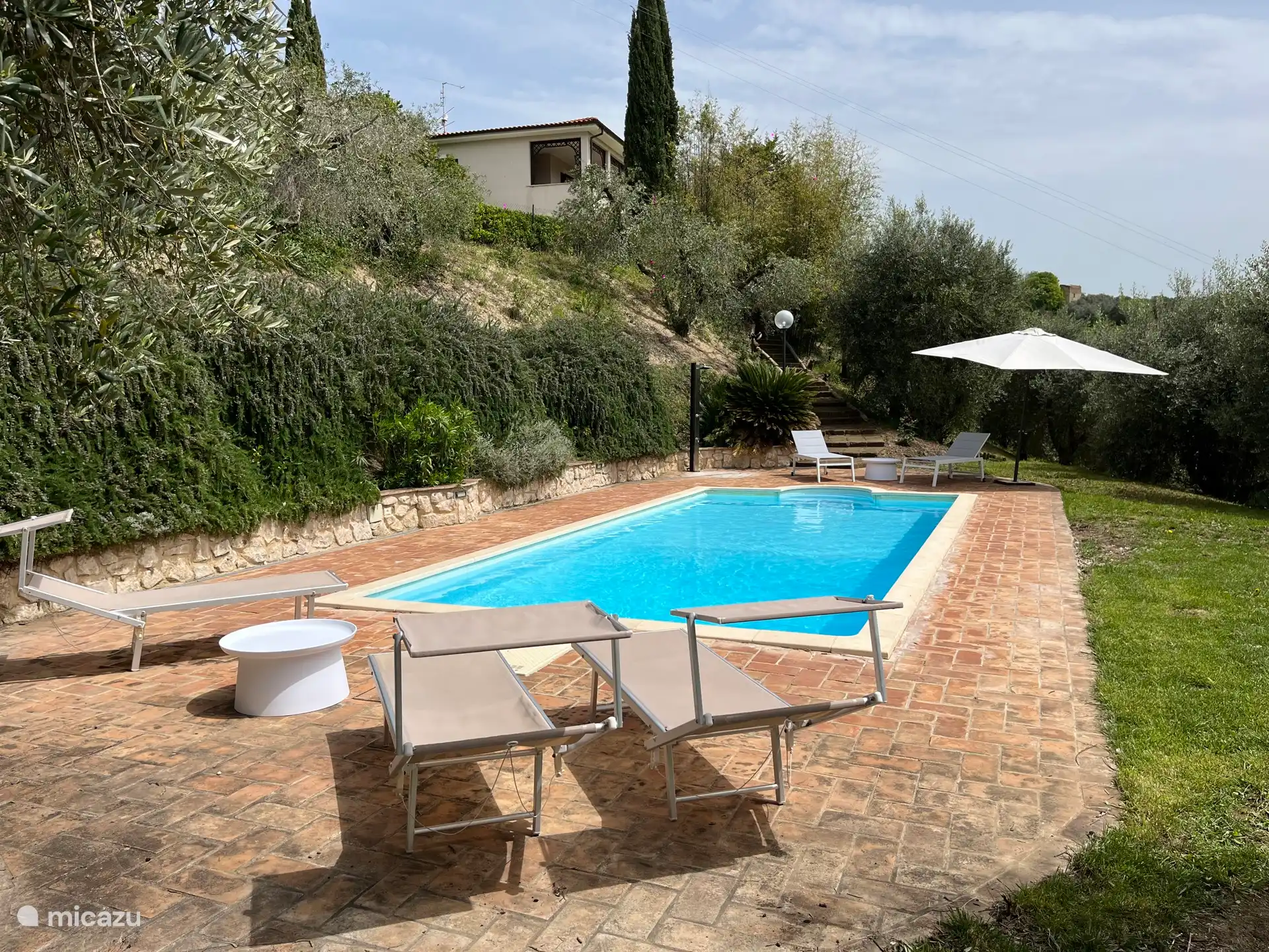 Swimming pool with a view of the house above