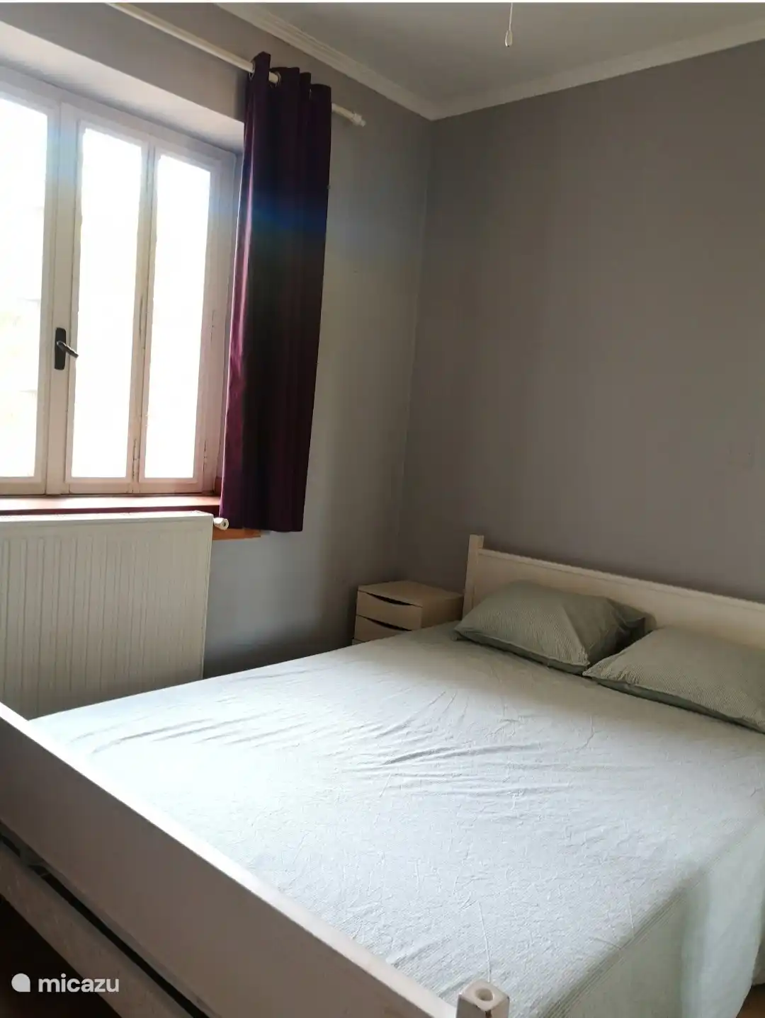 Schlafzimmer 3 mit einem Doppelbett 