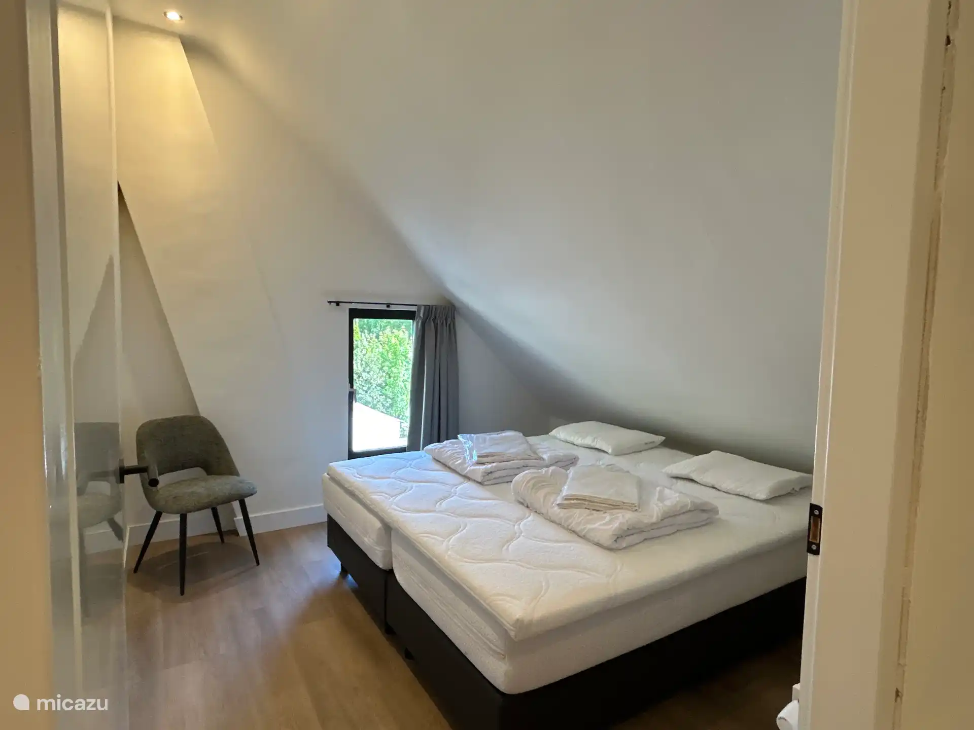 2 bedrooms upstairs with box spring beds. Choice of 1 person or 2 person mattresses