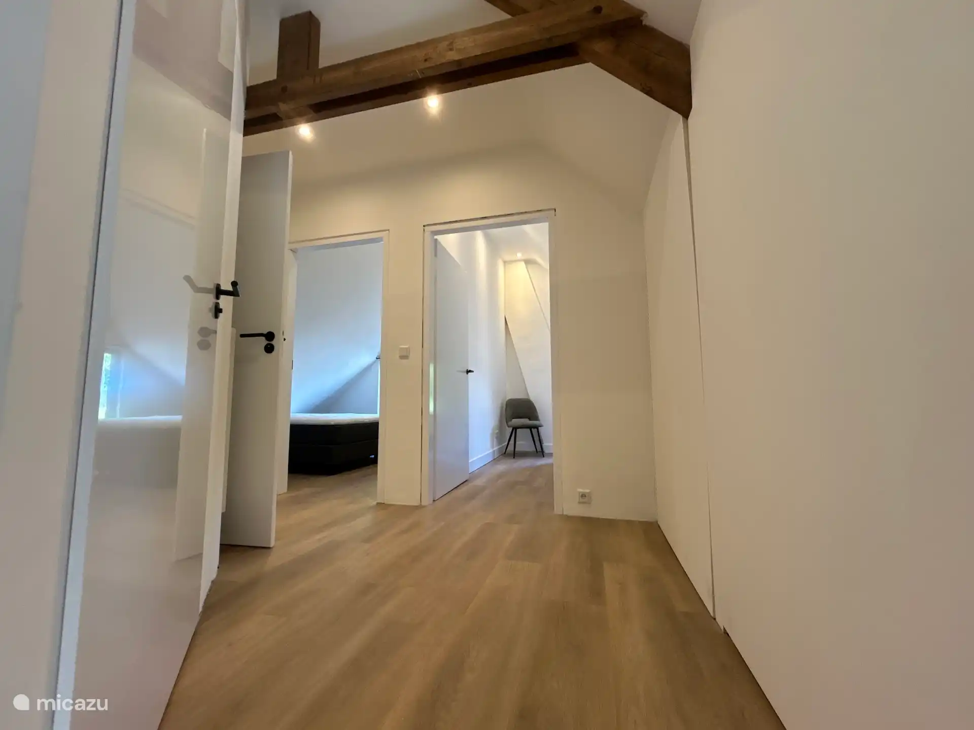 Upper floor, modern with characteristic wooden elements of the past