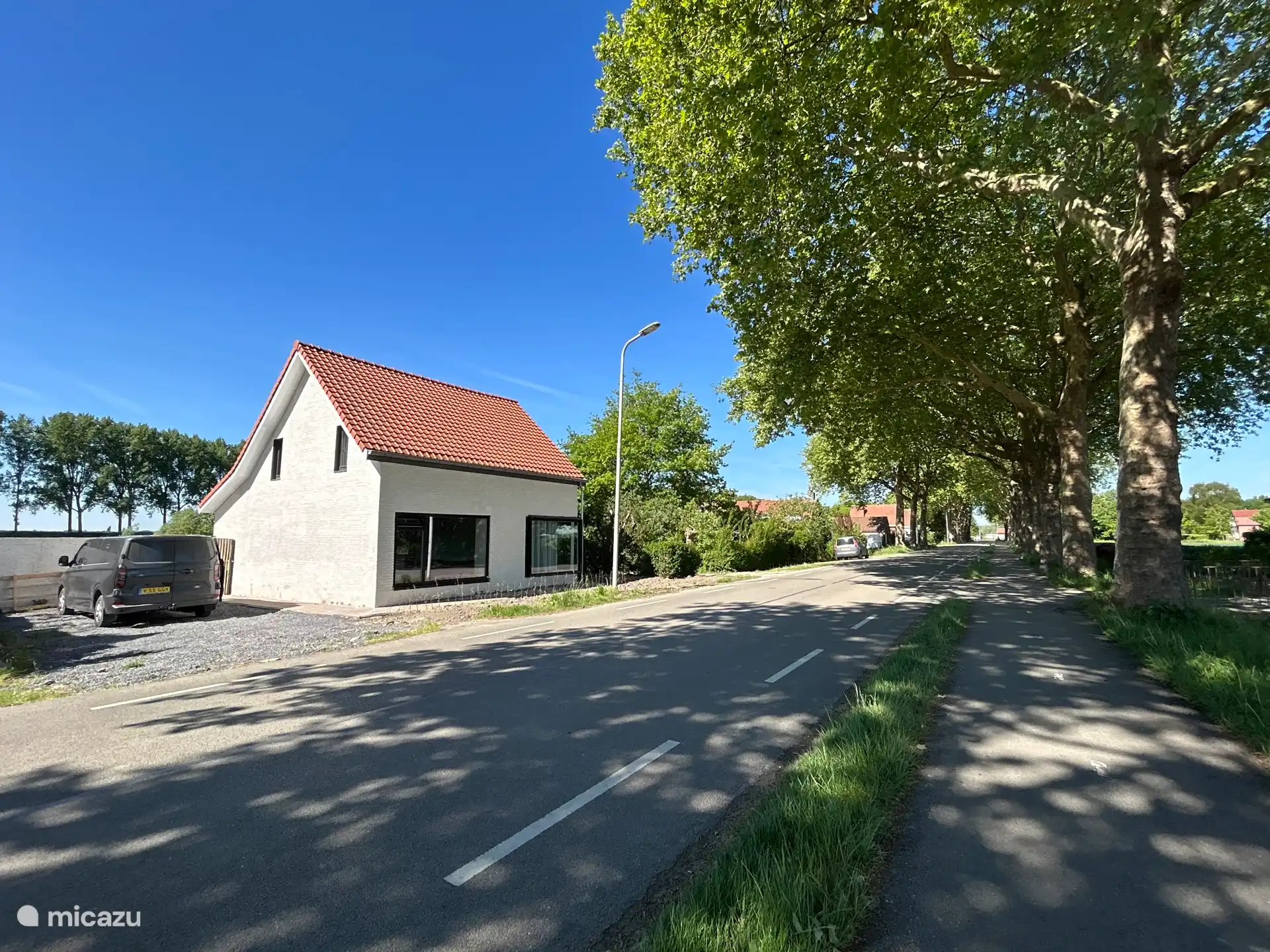 Front of the house with parking for 2 cars to the left of the house. Possibly extra parking at the back of the house