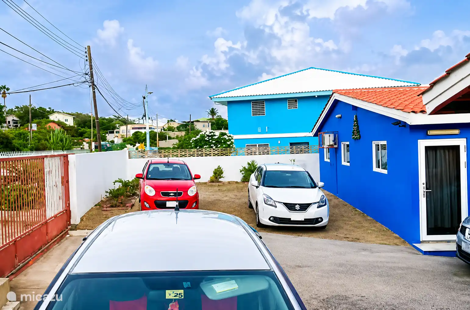 Gated, fenced yard with free private parking