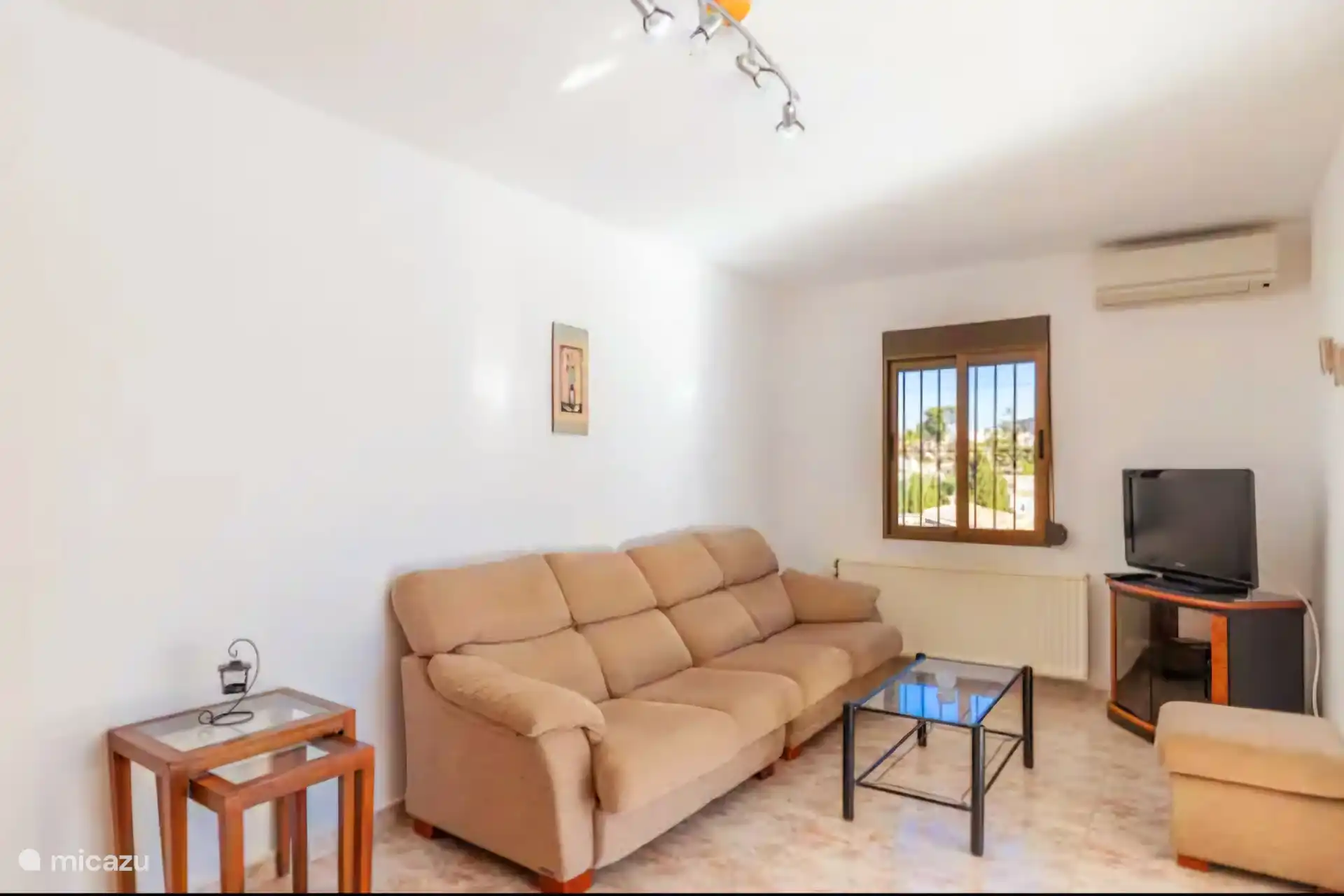 Sala de estar más tv