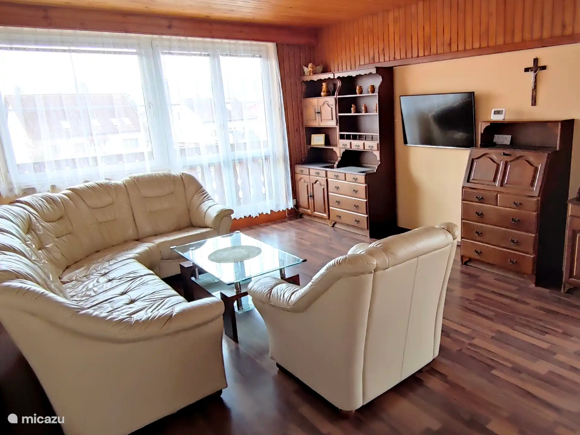 Ruime en gezellige woonkamer met zithoek