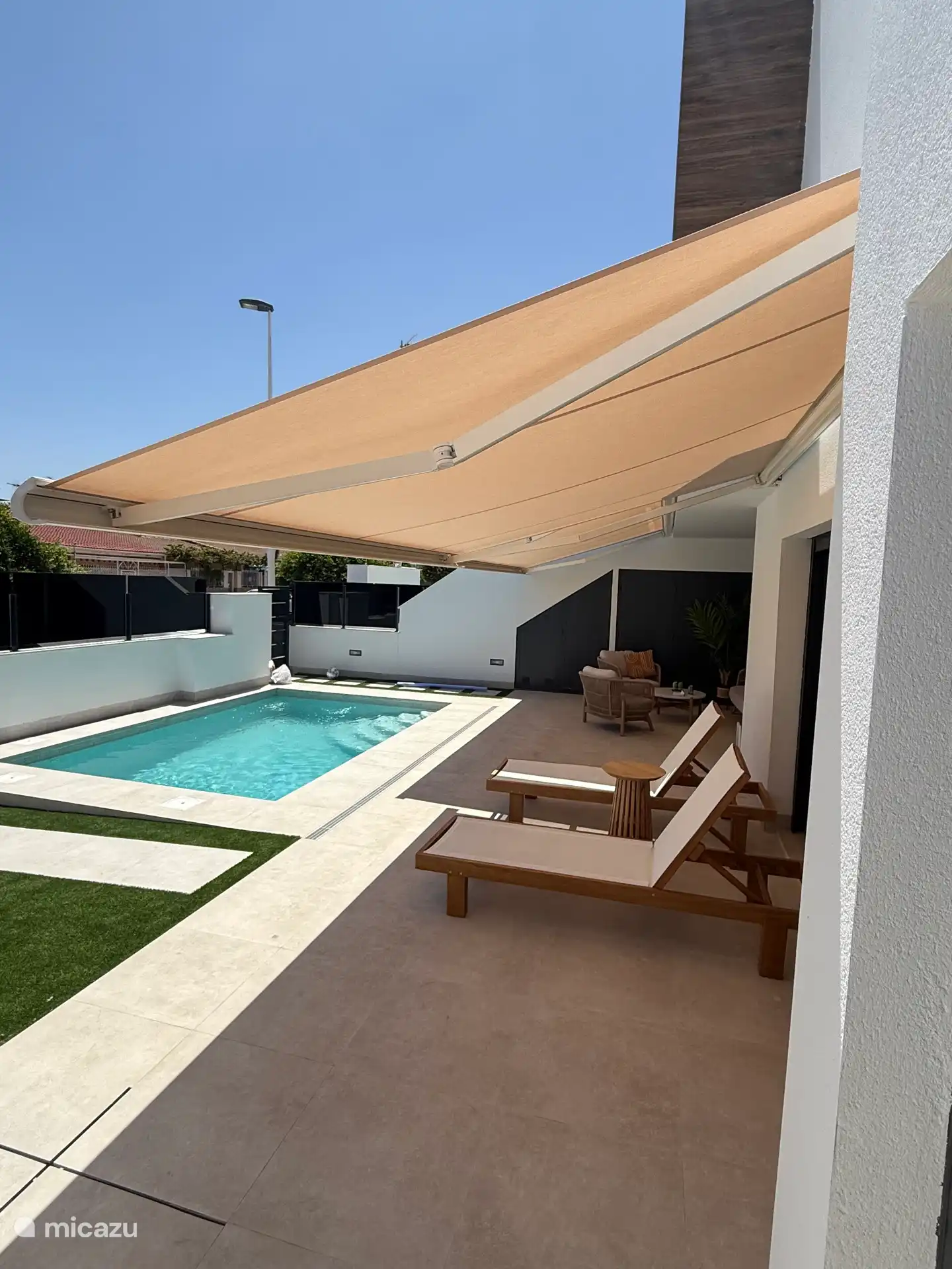 Piscina, conjunto de salón Ibiza, toldo extensible