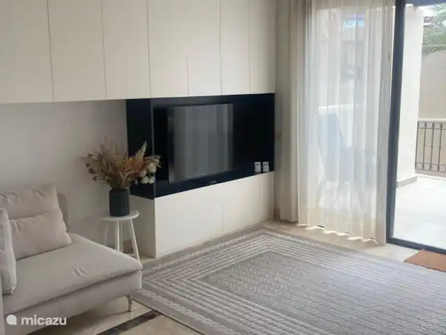 Location de Vacances Espagne, Costa Cálida, San Javier, penthouse - Penthouse Pentaguila  Dans le salon, il y a une télévision de belle taille et beaucoup d’espace de rangement dans les placards.