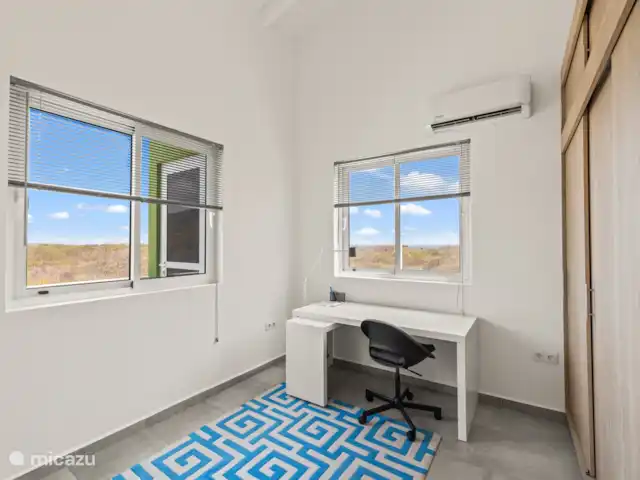 Punta Azul Ocean Resort 5B | Curaçao, Banda Abou (ouest), Westpunt - maison de vacances Espace de travail compact avec bureau - idéal pour ceux qui veulent combiner travail et détente.