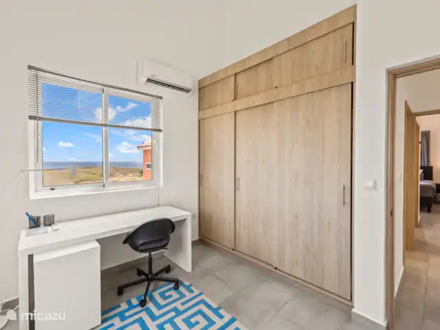 Punta Azul Ocean Resort 5B | Curaçao, Banda Abou (ouest), Westpunt - maison de vacances Espace de travail compact avec bureau - idéal pour ceux qui veulent combiner travail et détente.