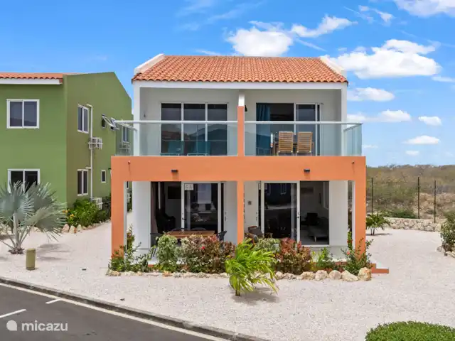 Punta Azul Ocean Resort 6A | Curaçao, Banda Abou (ouest), Westpunt - maison de vacances Maison orange caractéristique avec un aspect chaleureux.