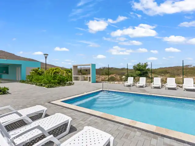 Punta Azul Ocean Resort 6A | Curaçao, Banda Abou (ouest), Westpunt - maison de vacances Piscine au bord de la mer - profitez d’un rafraîchissement avec vue sur l’horizon infini.