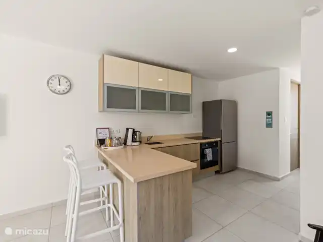 Punta Azul Ocean Resort 6B | Curaçao, Banda Abou (ouest), Westpunt - maison de vacances Cuisine équipée élégante avec tous les appareils nécessaires - idéale pour cuisiner confortablement pendant votre séjour.