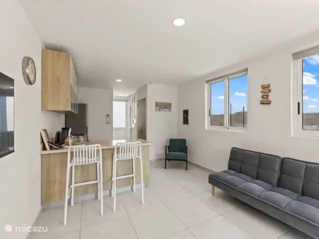 Punta Azul Ocean Resort 6B | Curaçao, Banda Abou (ouest), Westpunt - maison de vacances Salle à manger bien entretenue avec table à manger et chaises confortables - idéale pour les repas partagés.