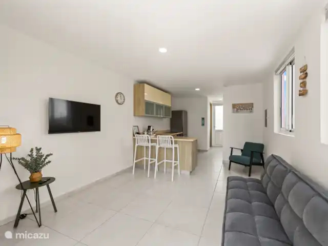 Punta Azul Ocean Resort 6B | Curaçao, Banda Abou (ouest), Westpunt - maison de vacances Salle à manger bien entretenue avec table à manger et chaises confortables - idéale pour les repas partagés.