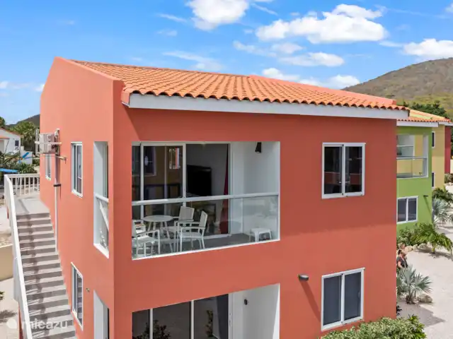 Seabreeze 10B - Punta Azul Ocean Re | Curaçao, Banda Abou (ouest), Westpunt - maison de vacances Cette maison rouge attire immédiatement l’œil et allie couleur et confort dans un environnement naturel.