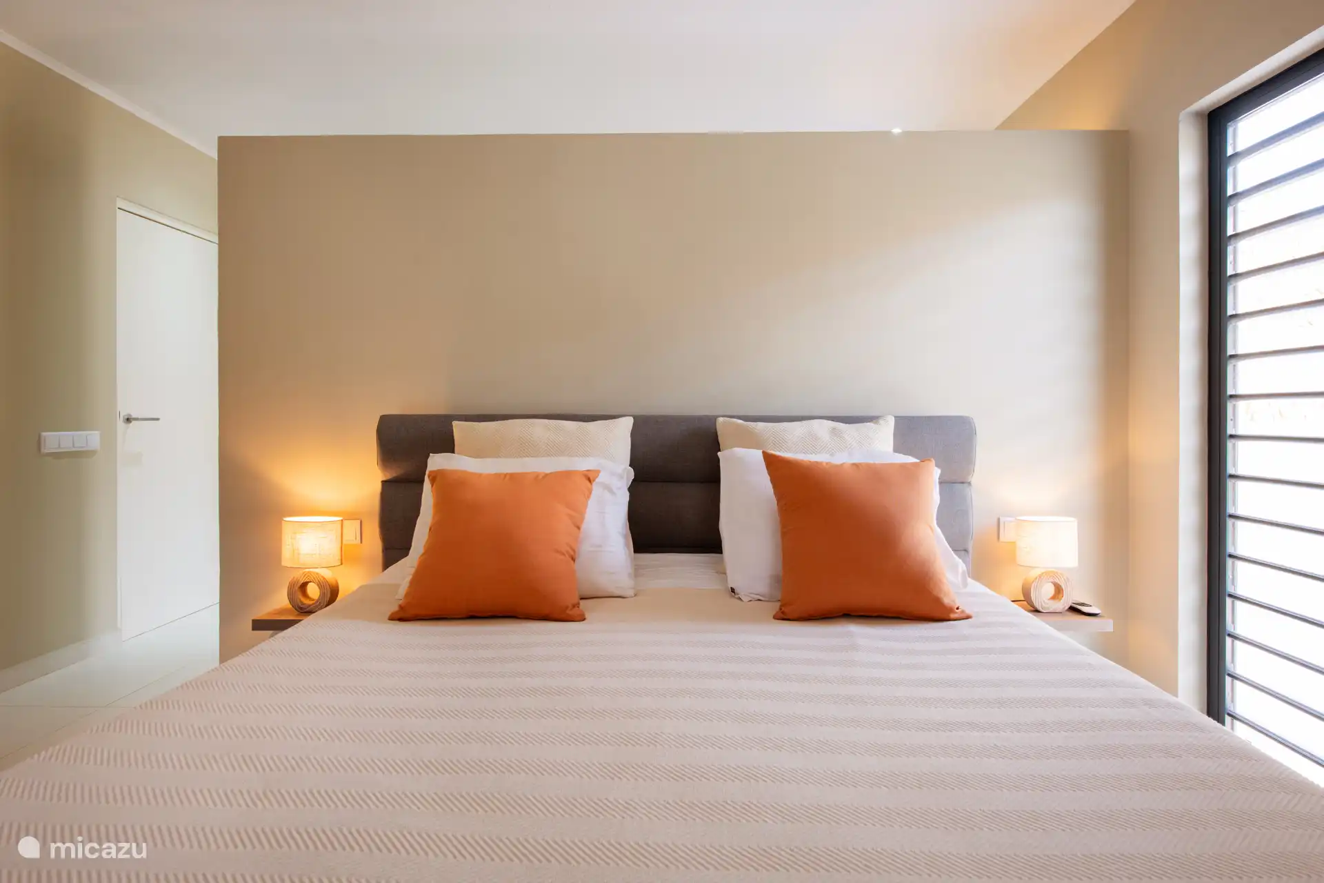 Attractive second bedroom with box spring 180 wide.