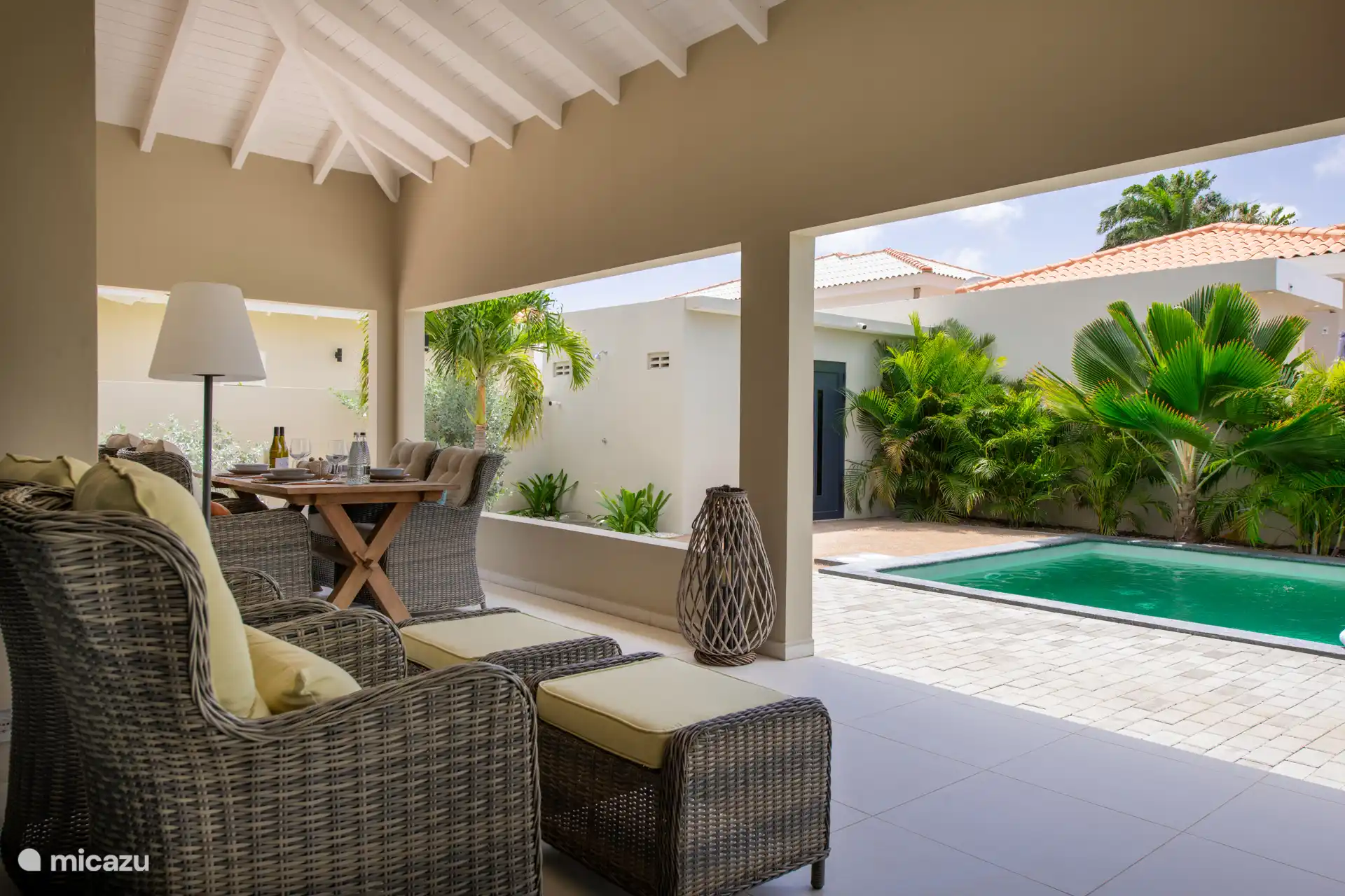 Comfortable chairs with footrest. A lovely place to read or drink a glass of wine in the evening