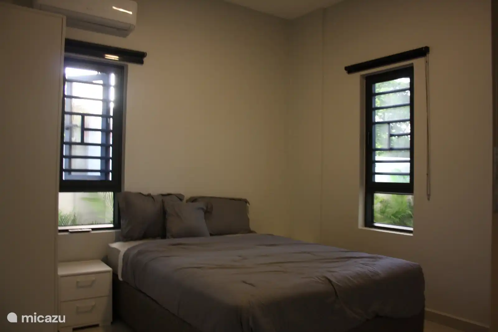 2nd spacious bedroom with air conditioning.