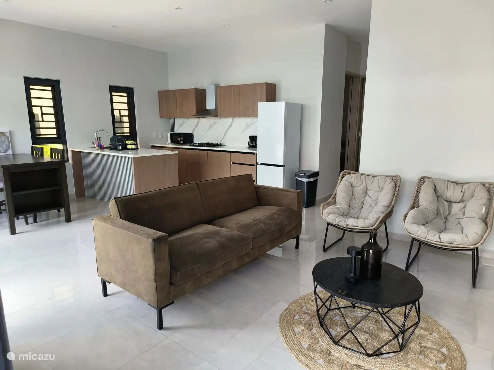 Spacious living room fully equipped.