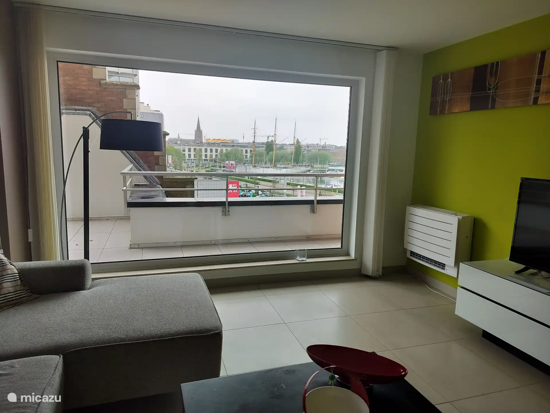 vanuit living frontaal zee haven zicht 