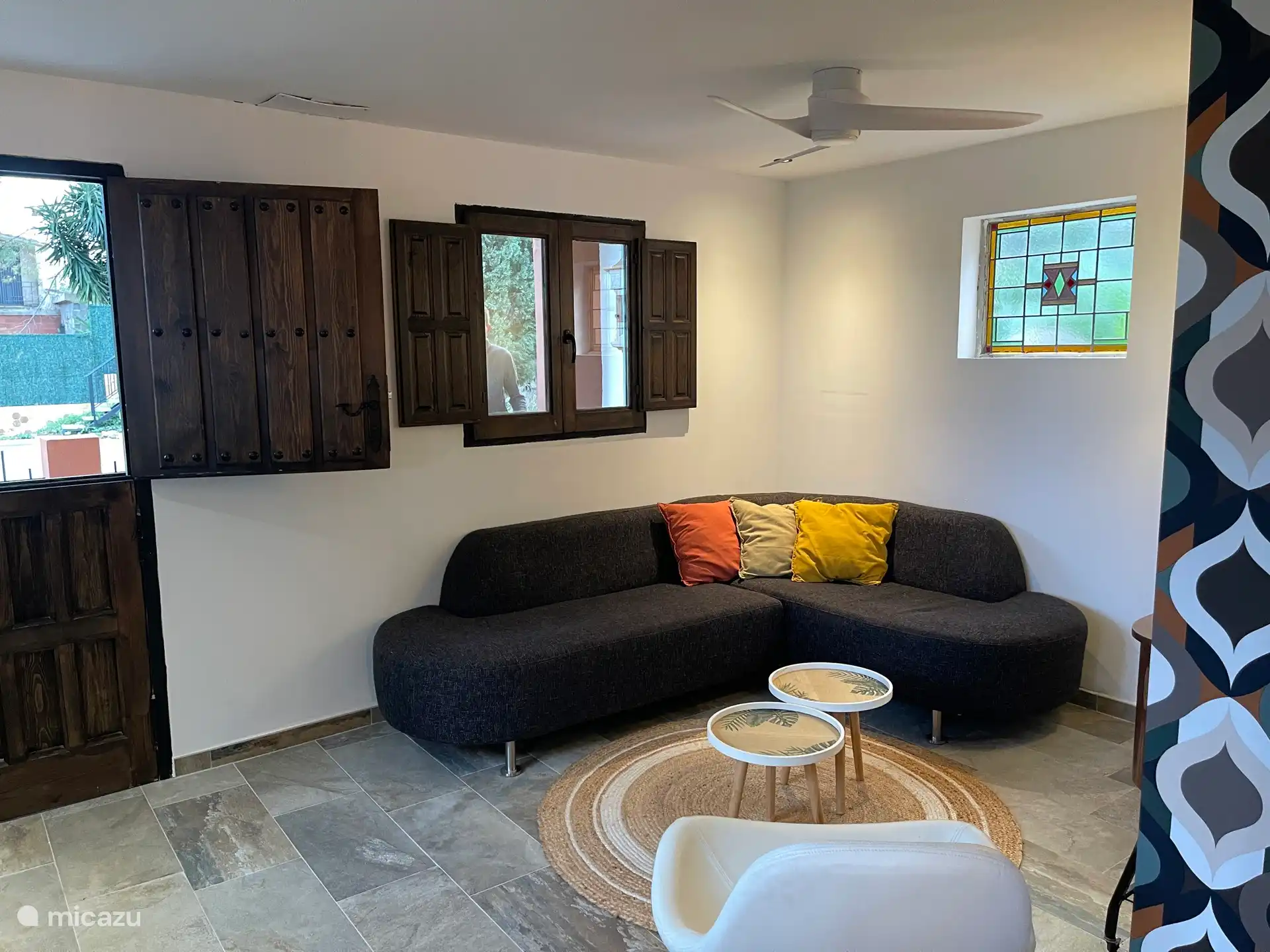 La acogedora sala de estar de Casa Deseo