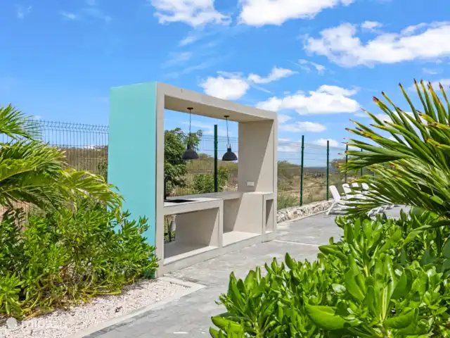 Punta Azul 12A Ocean resort  en Curazao, Bandabou (oeste), Lagun - apartamento Elegante casa de piscina justo al lado de la piscina, ideal para sombra, relajación y mayor comodidad.