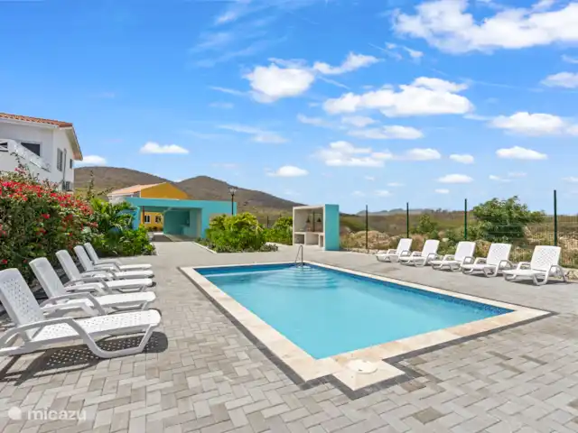 Punta Azul 12A Ocean resort  en Curazao, Bandabou (oeste), Lagun - apartamento Piscina junto al mar: disfrute de un refresco con vistas al horizonte infinito.