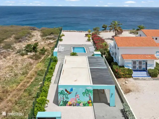 Punta Azul 12A Ocean resort  en Curazao, Bandabou (oeste), Lagun - apartamento Piscina junto al mar: disfrute de un refresco con vistas al horizonte infinito.