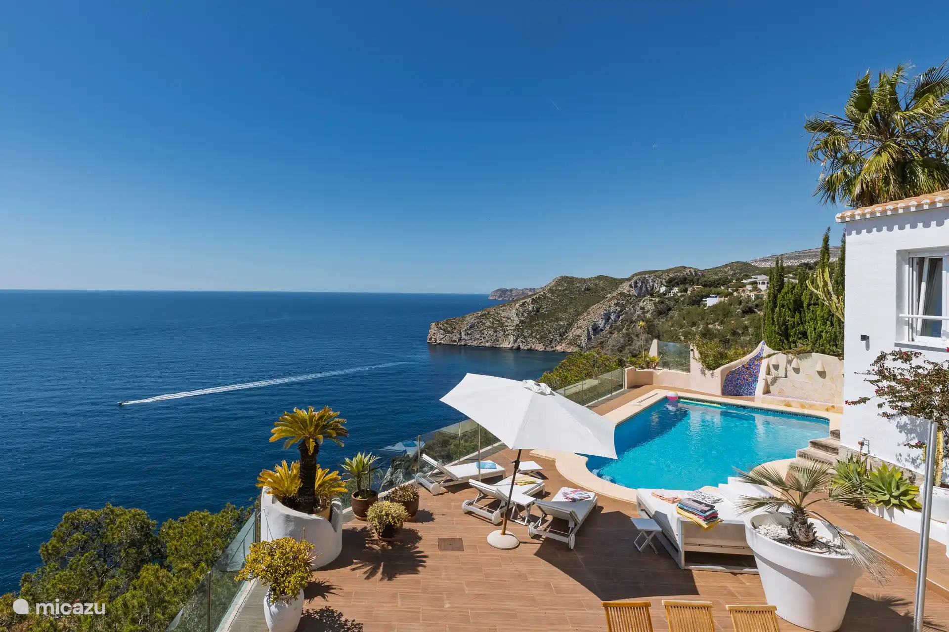 view from terrace with swimming pool