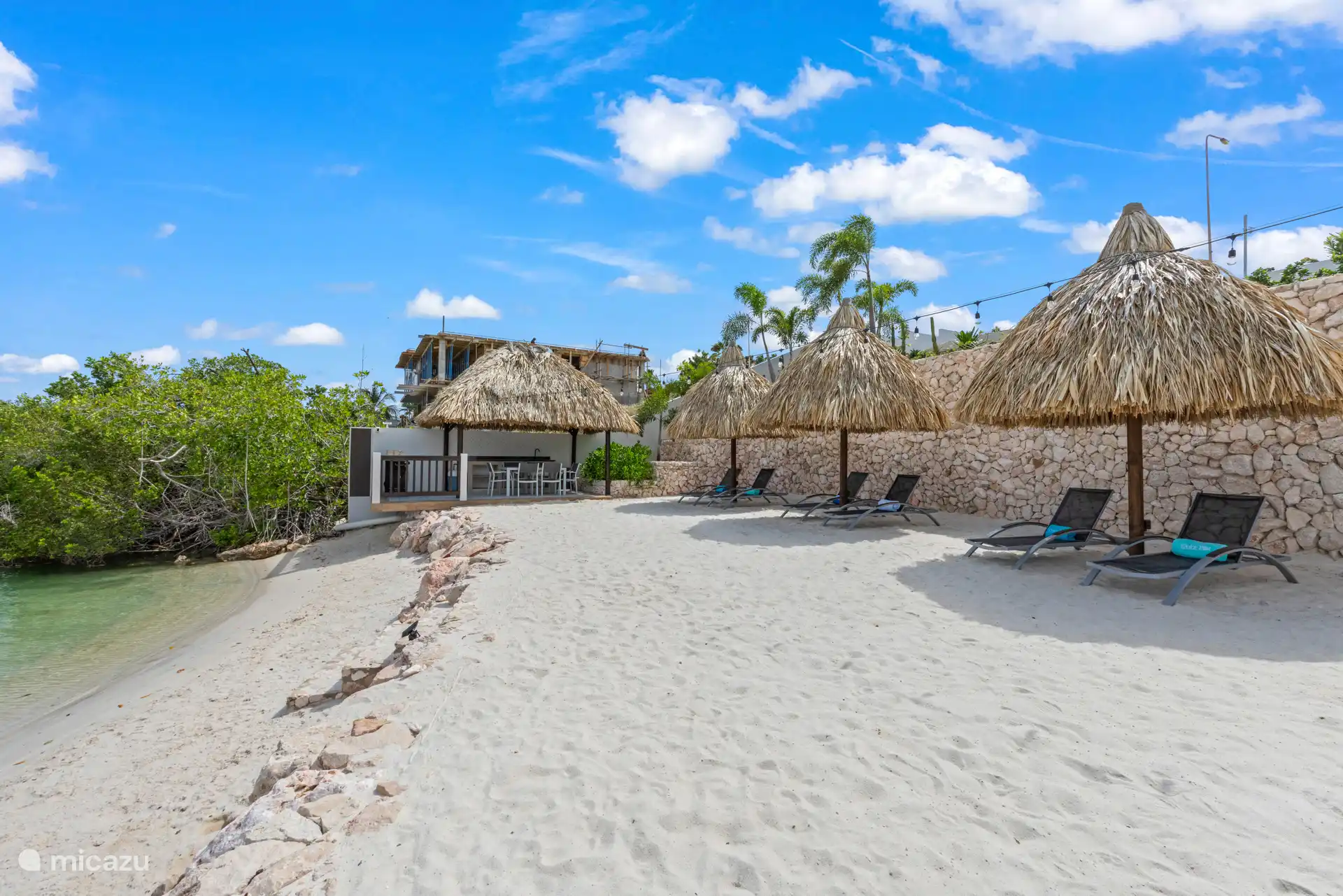 Zugang zu einem Privatstrand mit Palapas und Sonnenliegen (gemeinsam mit nur 2 anderen Bungalows)