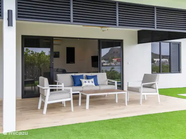 Dolce Vita Beach - Waterfront C huren in Curaçao, Banda Ariba (oost), Jan Sofat - bungalow Grote schuifdeuren voor een naadloze overgang van binnen naar buiten