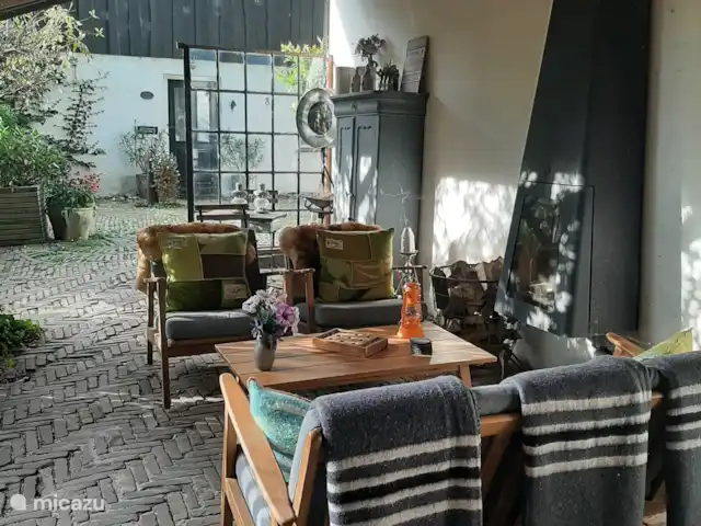 casa vacacional en Países Bajos, Güeldres, Dodewaard – La nuez diminuta Bajo la marquesina hacia la plaza.