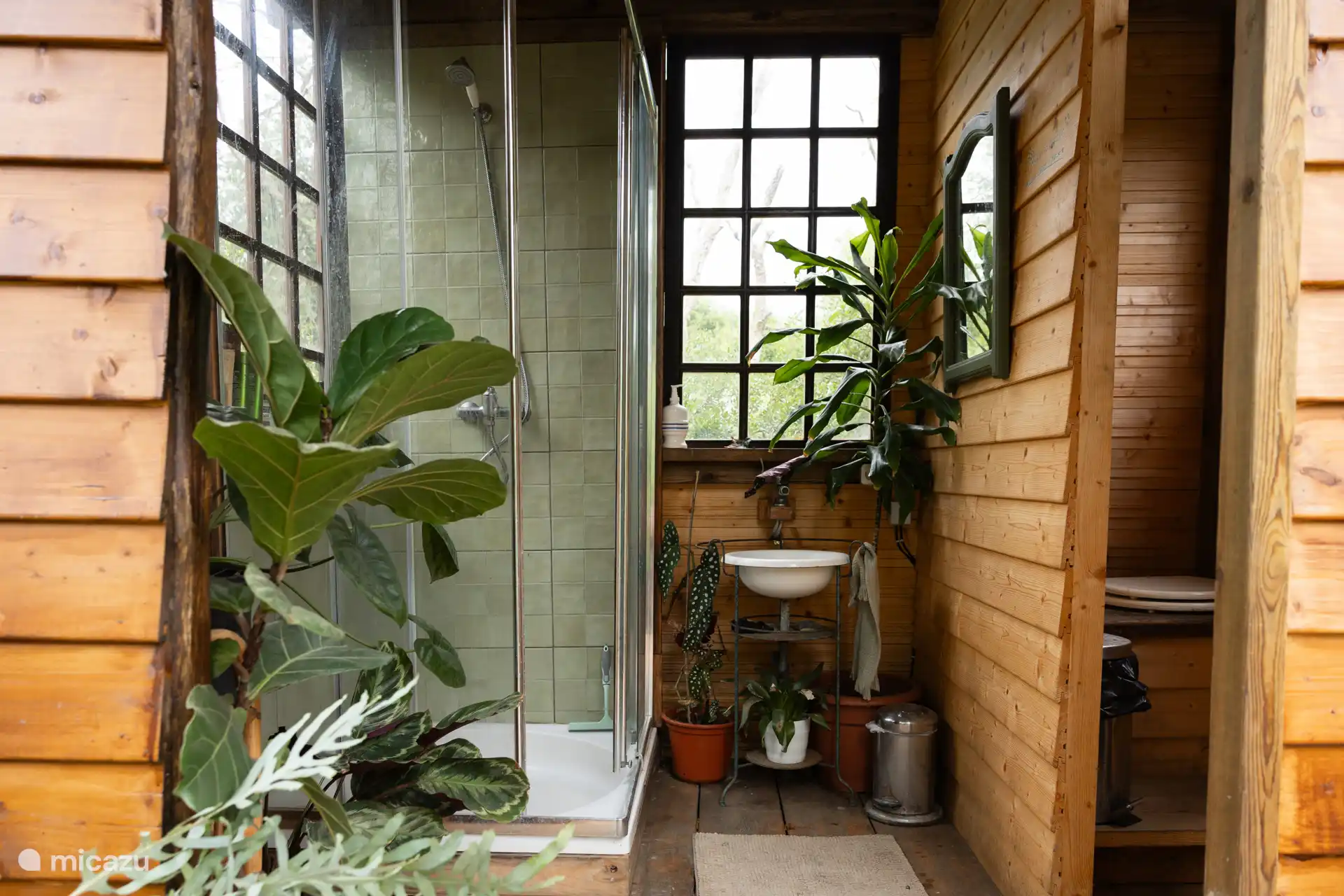 The shower and on the right the eco-compost toilet where you sprinkle sawdust instead of flushing it with water