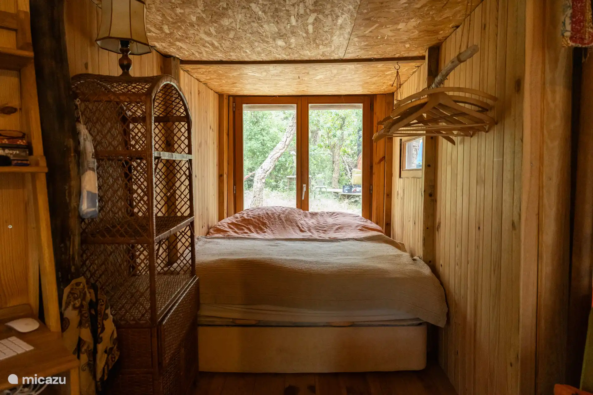 The extension as a bedroom with closet and hanging space