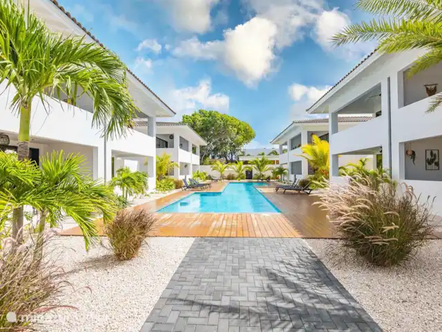apartamento en Curazao, Banda Arriba (este), Jan Thiel – Penthouse Sunny Palm Curazao CBW 366 Resort - piscina y jardín