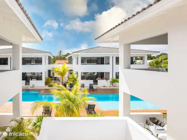 apartamento en Curazao, Banda Arriba (este), Jan Thiel – Penthouse Sunny Palm Curazao Vista al jardín y a la piscina