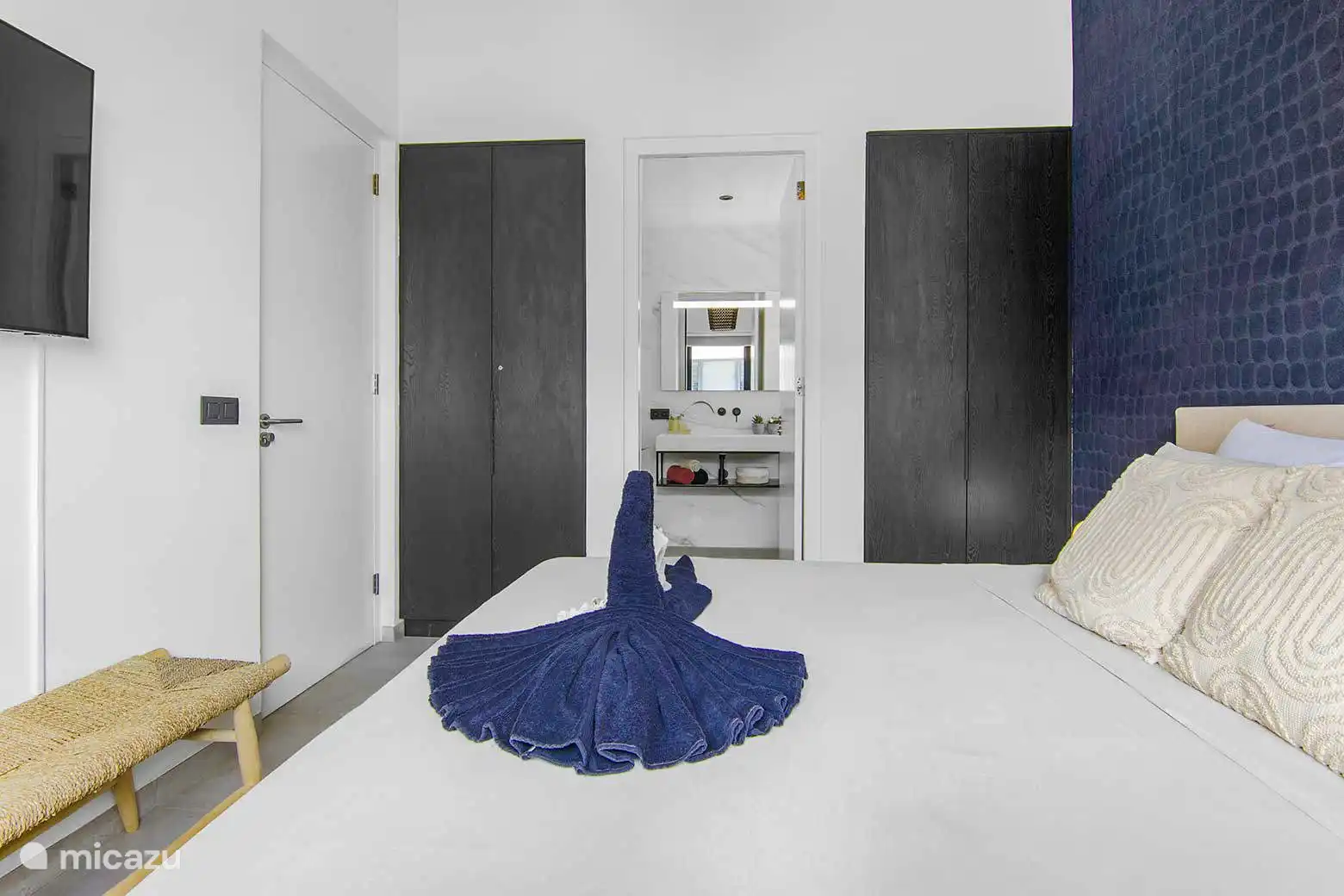 Dormitorio 1 con aire acondicionado y baño privado