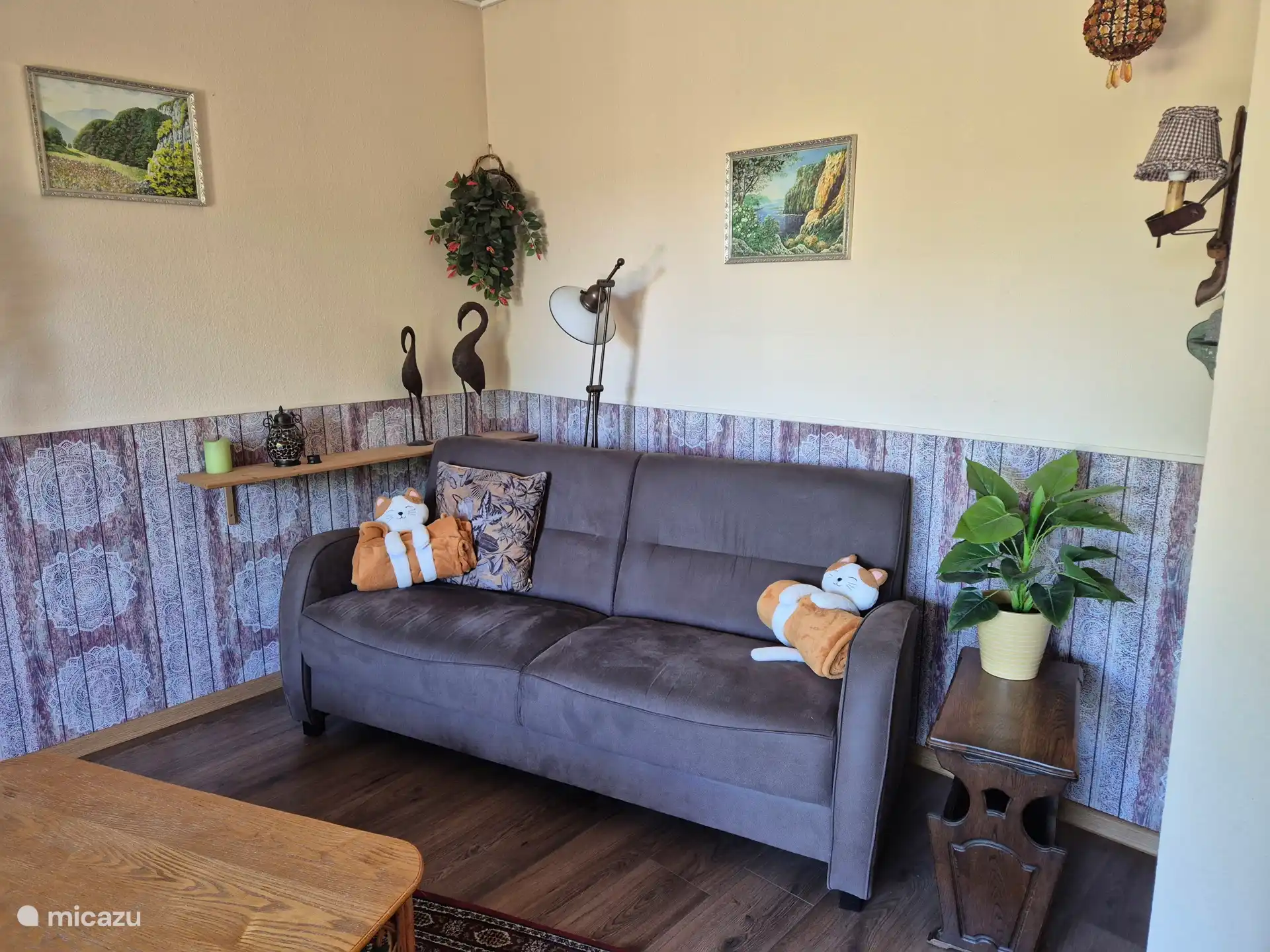 Sitting area with 3 seater sofa.